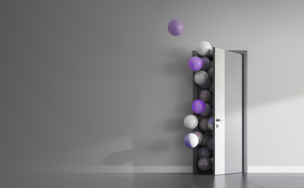 Image of balls flowing through a door